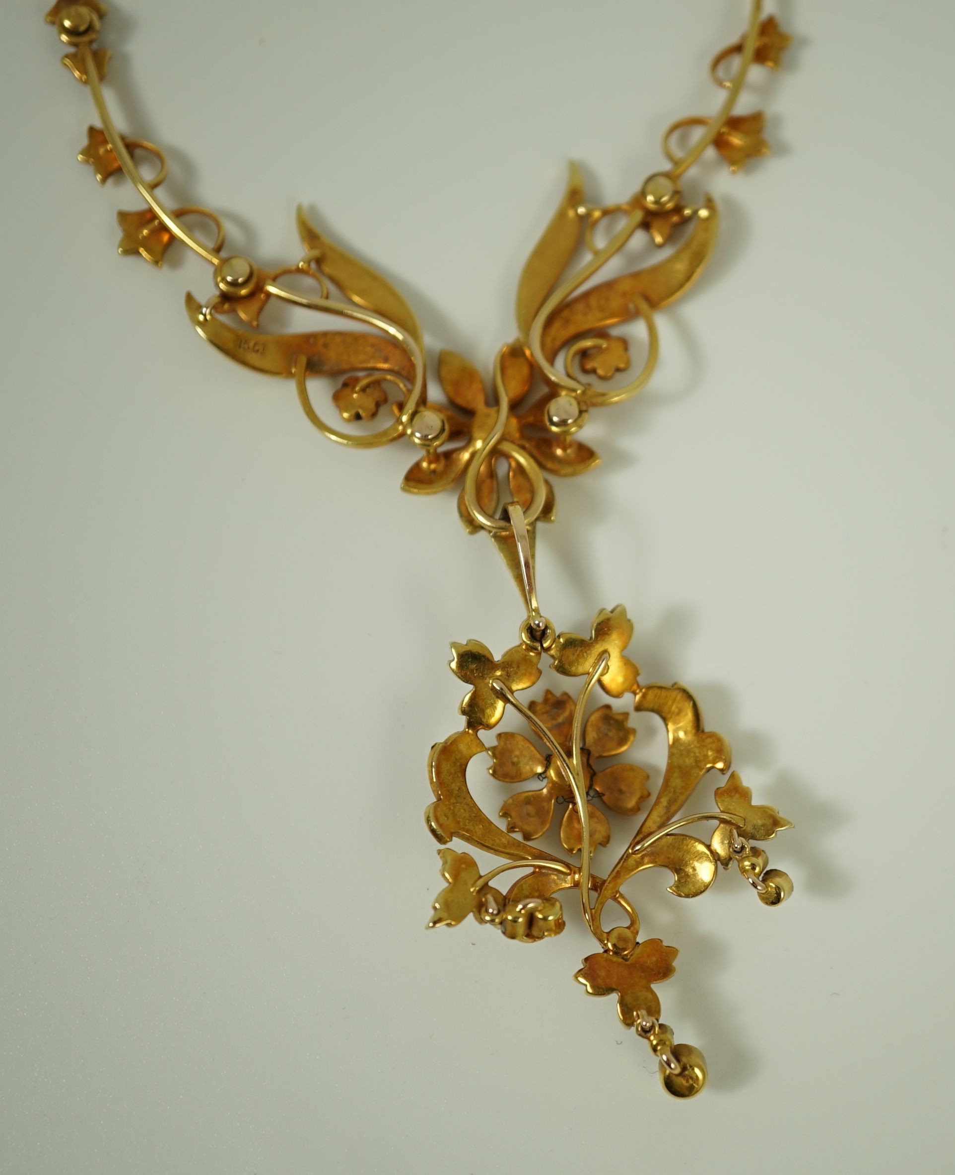 A late Victorian 15ct gold and seed pearl set drop pendant necklace